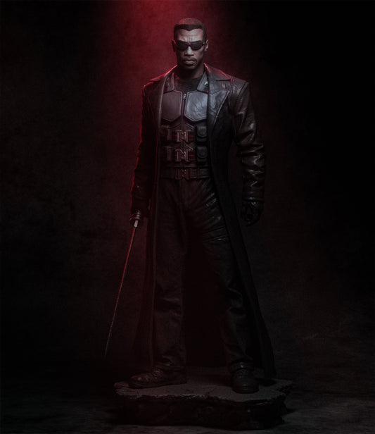 Blade collectible figurine, standing in a battle-ready stance with his sword drawn.