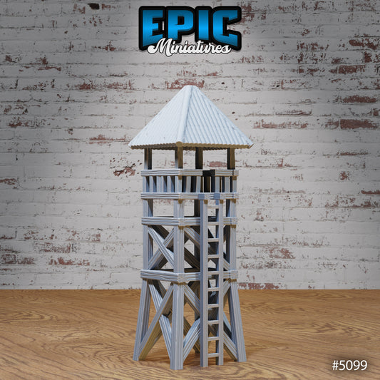 Wooden prison watch tower miniature with timber cross‑beam frame, ladder, and roofed lookout platform; 3D‑printed terrain by Epic Miniatures.