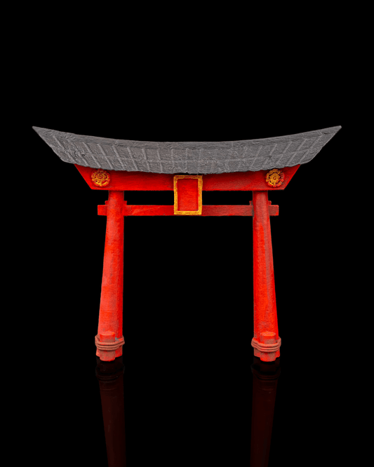 Japanese torii gate terrain piece featuring curved roof and detailed wood texture for tabletop or display scenes.