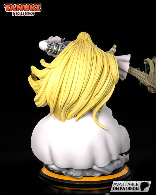 Rear view of the figure showing the full length of Basil’s yellow hair and flowing white coat.