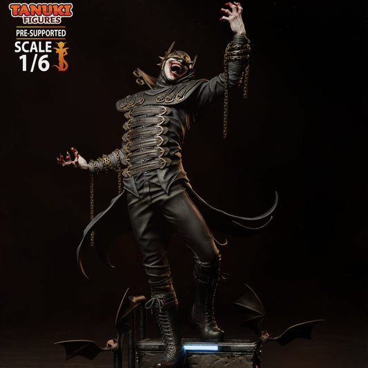 Front view of Batman Who Laughs figurine with spiked visor helmet, leather trench coat, and chains in hand.