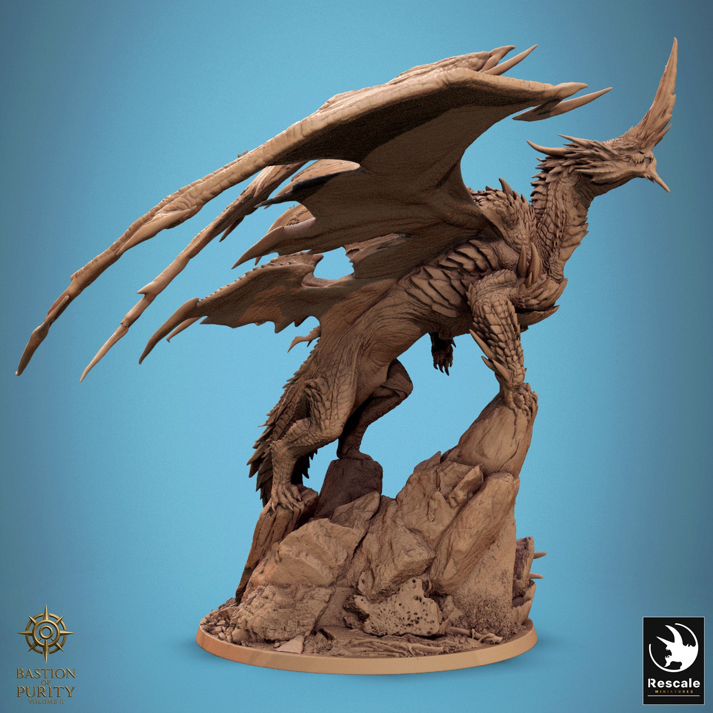 Side angle of Chromatic Blue Dragon 2024 redesign model standing on a high stone outcrop with wings unfurled and tail extended down the rocky base.