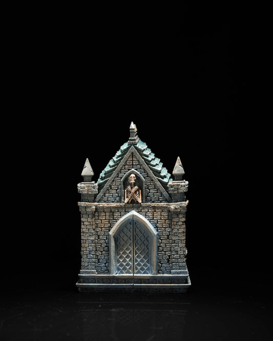 Close-up of crypt prop from Graveyard of Sorrows. Featuring lovely skeleton decor—because nothing says 'eternal rest' like public skeletons