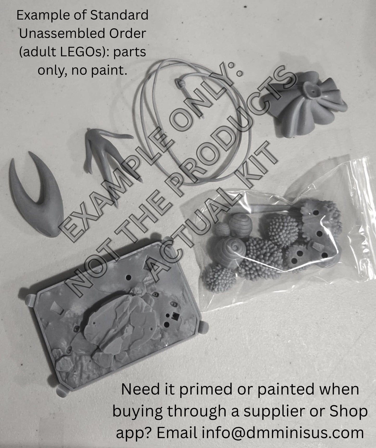 Unassembled parts on a white background with text indicating it's not the actual product.