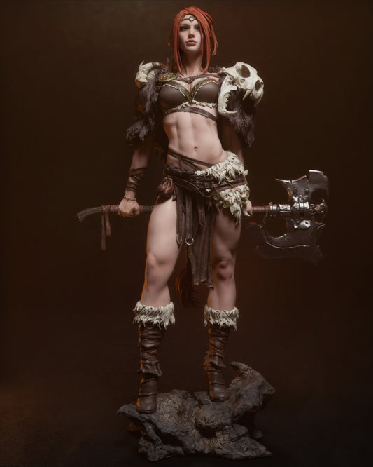 Full front view of the Barbarian Queen in a powerful stance, showcasing her muscular physique, tribal armor, and skull shoulder pad.