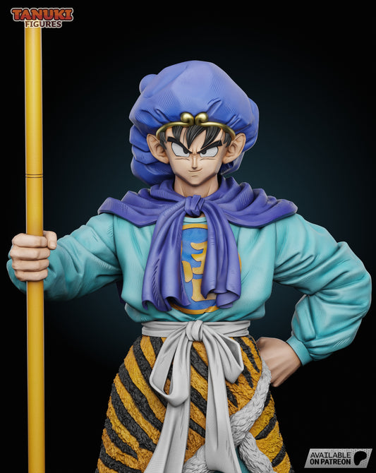A detailed close-up of Goku’s determined expression, wearing a blue turban and cape with gold accents, gripping the Power Pole.