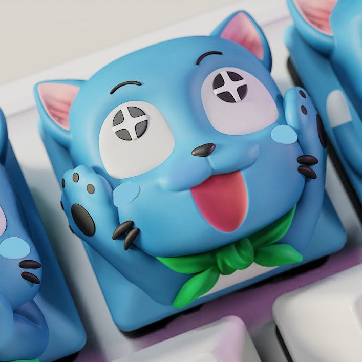 Close-up of the Cheerful Happy keycap from Fairy Tail, showing a blue cat with a joyful grin and raised paws, capturing a playful anime-inspired design on a keyboard.