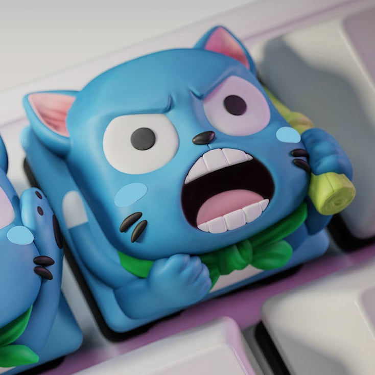 Close-up of the Angry Happy keycap from Fairy Tail, depicting the blue cat with an open mouth in a shouting pose, holding a rolled scroll, displayed on a mechanical keyboard.