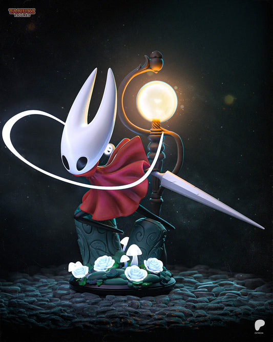 Front angle of the Chibi Hornet figure highlighting her poised stance, swirling cloak, and detailed base featuring roses, mushrooms, and cobblestones.