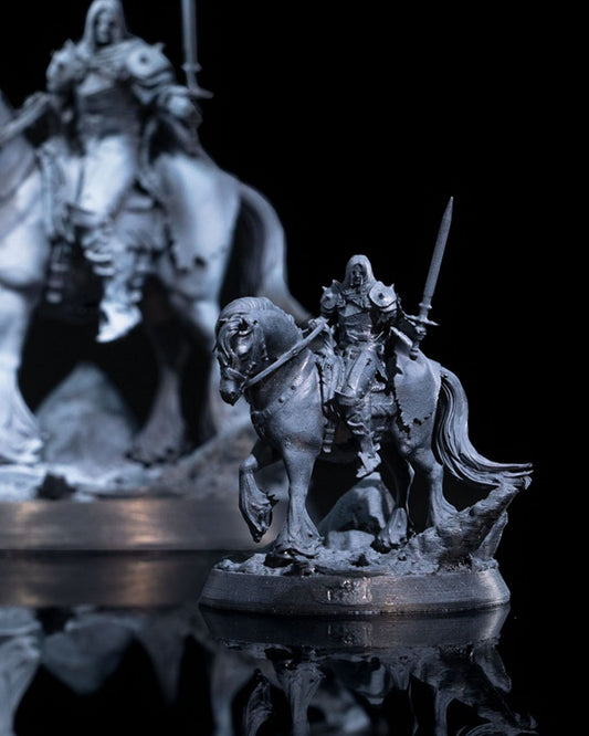 Side-by-side view of the Knight miniature in different scales, showing the intricate details of the armor, horse, and raised sword.