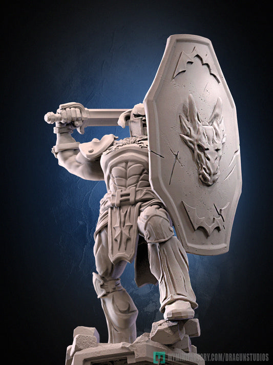Front view of Lt. Bitter miniature showing an armored male warrior in a strong stance holding a large sword across his chest, inspired by Golden Axe.