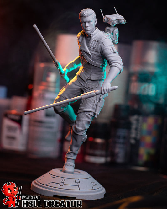 Full view of Cal Kestis statue in combat stance with dual sabers, detailed sci-fi base, and BD-1 companion.