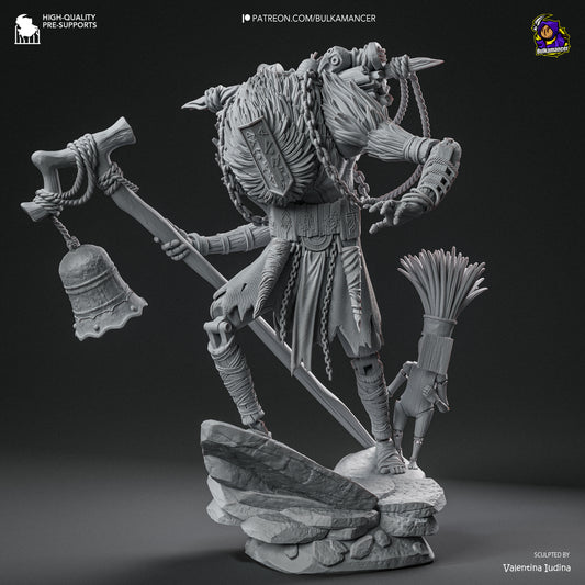 Monoco figure side view with staff and bell raised, detailed ropes, carvings, and ceremonial attire – 1:8 scale collectible for dark fantasy RPG display.
