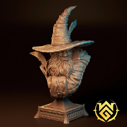 Scrib Galloway gnome wizard bust wearing a tall pointed hat, long beard, and round spectacles, holding a quill pen, arcane scholar character bust for fantasy tabletop or display