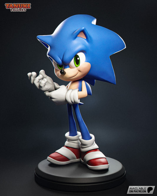 A dynamic full-body collectible of Sonic the Hedgehog standing on a round black base, wearing his iconic red shoes and white gloves, striking a playful yet determined pose.