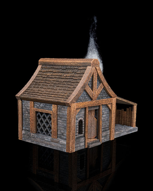 Painted terrain of The Grinning Hammer blacksmith shop, featuring a timber-framed building with an open front work area, stone foundation, and large smokestack.