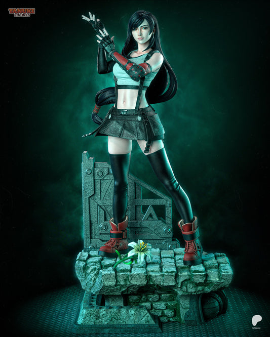 Tifa Lockhart 1:6 scale statue Final Fantasy VII figure with dynamic martial arts pose, long hair, gloves, crop top outfit, and industrial rubble base