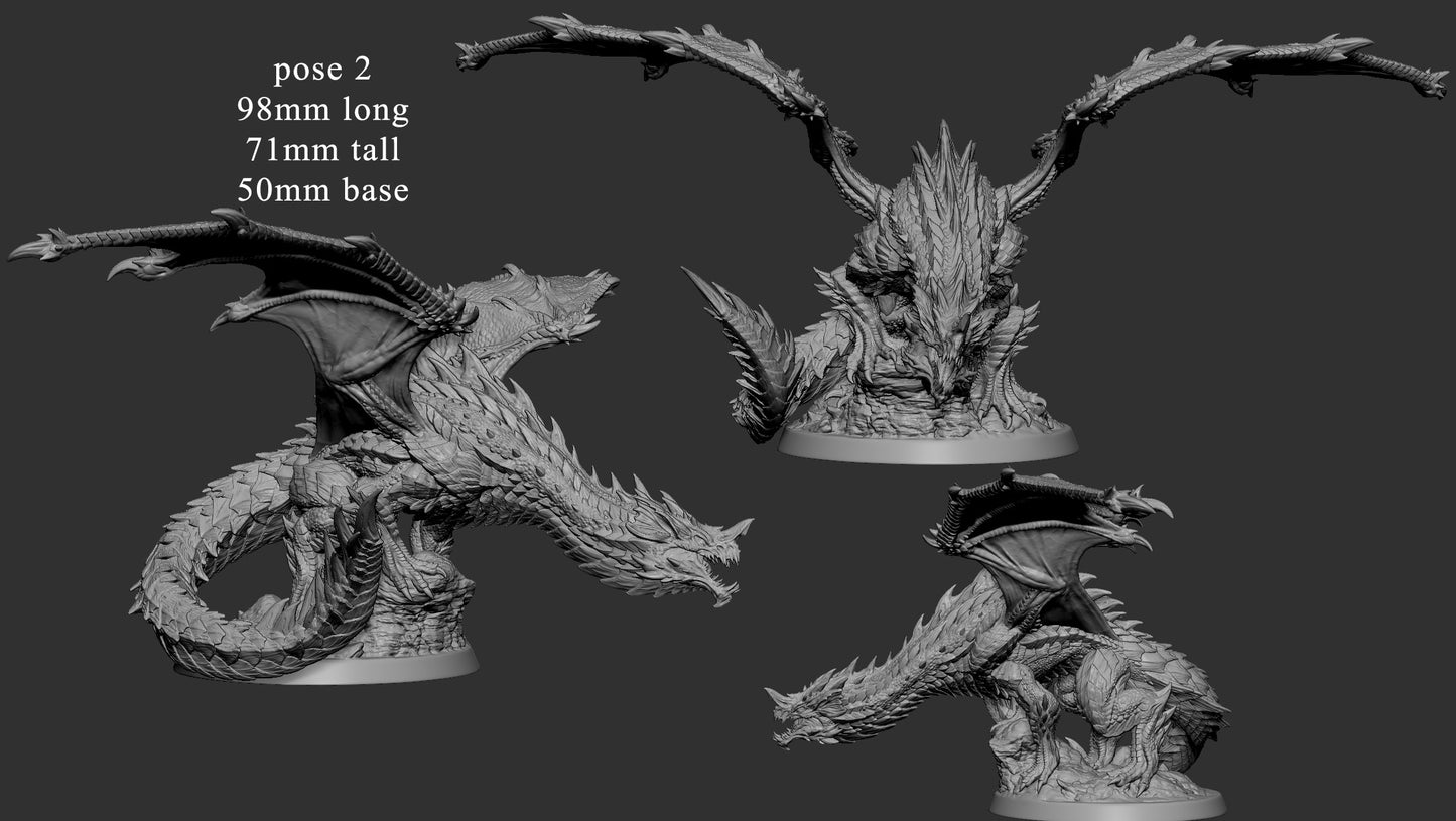 Side-by-side view of the crouching Adolescent Blue Dragon, measuring 98mm long and 71mm tall with a 50mm base.