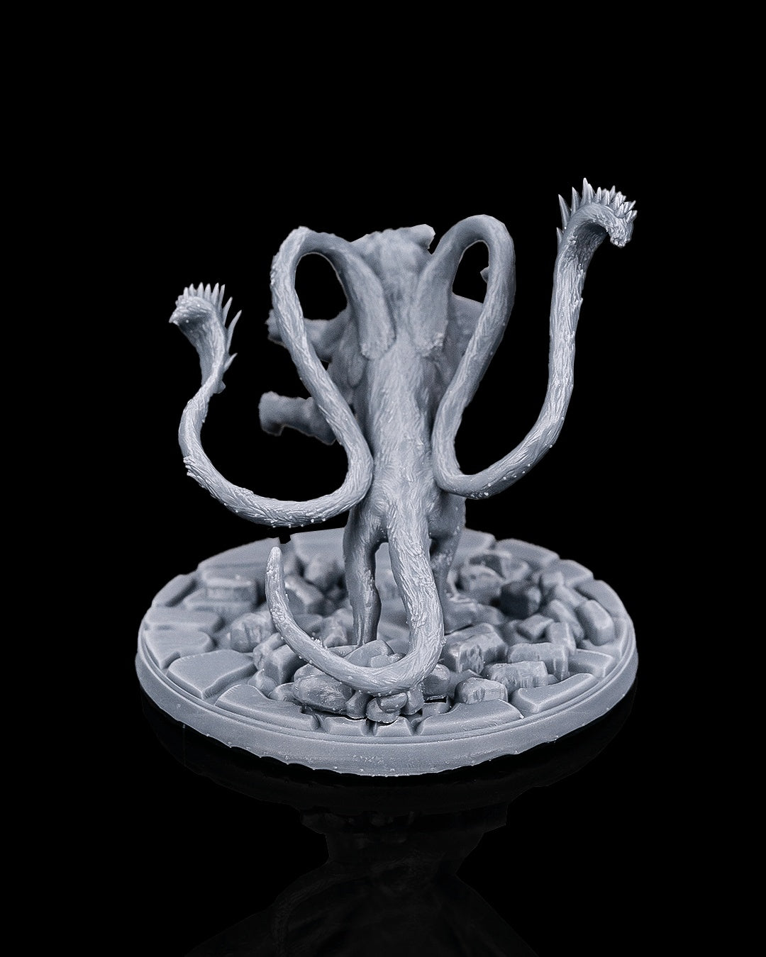 Displacer beast miniature rear view from Beldrad's Bag of Beasts with multiple tentacle tails, muscular feline body, and rocky base, eldritch panther aberration monster for Dungeons & Dragons encounters