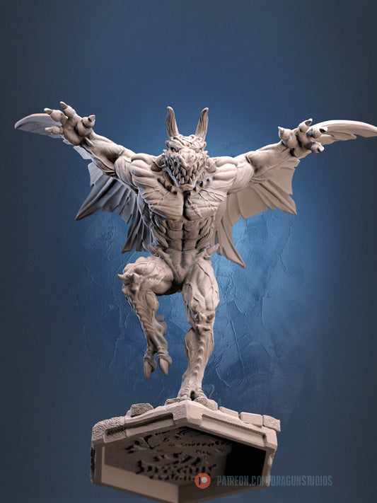 Unpainted Gaibon miniature in a front view, showing muscular torso, outstretched wings, on a hex base.