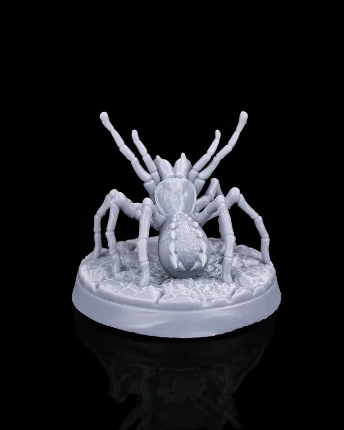 Giant spider miniature rear view from Beldrad's Bag of Beasts with long jointed legs, raised forelimbs, low stalking posture, and cracked stone base, huntsman spider beast for Dungeons & Dragons encounters