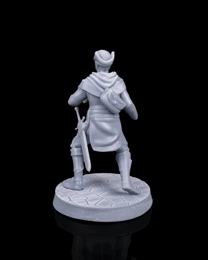 Slugs human rogue NPC miniature rear view showing cloak, belt gear, and sword sheath, fantasy tabletop character from Beldrad’s Bag of Beasts collection