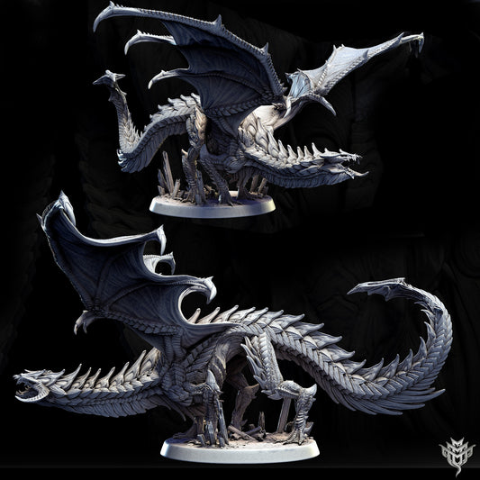Black dragon figurine showcasing intricate scale patterns and sharp claws atop a rocky base.