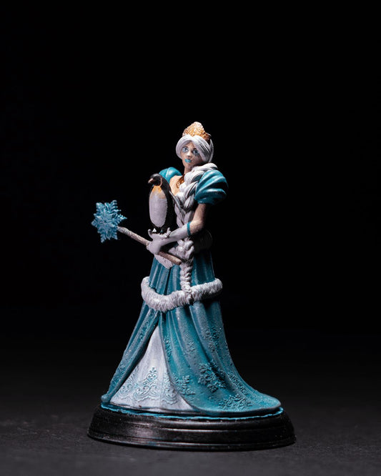 Astrid, a regal miniature character depicted in a flowing gown with intricate designs, holding a winter-themed staff and accompanied by a penguin, with a serene expression and braided hair, standing on a decorative base.