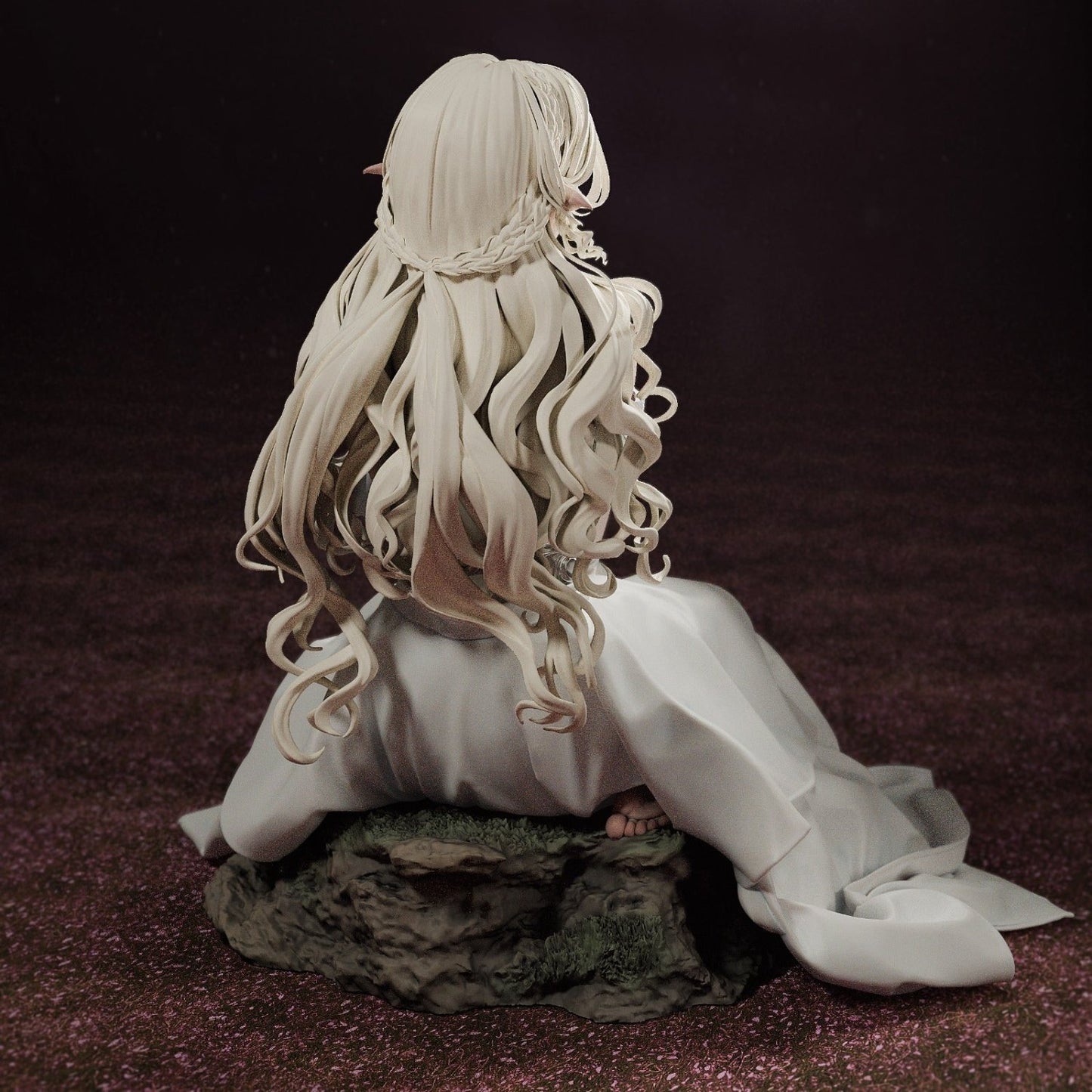 Back view of the Elf Princess figurine, highlighting the intricate braiding of her hair and elegant dress.