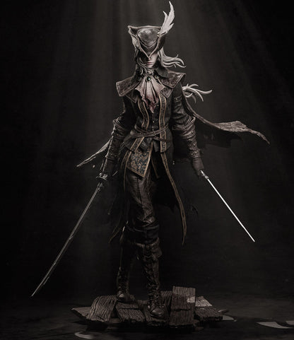 Front view of the Lady Maria collectible figure from Bloodborne, highlighting her dual-blade stance and detailed Victorian-inspired outfit.