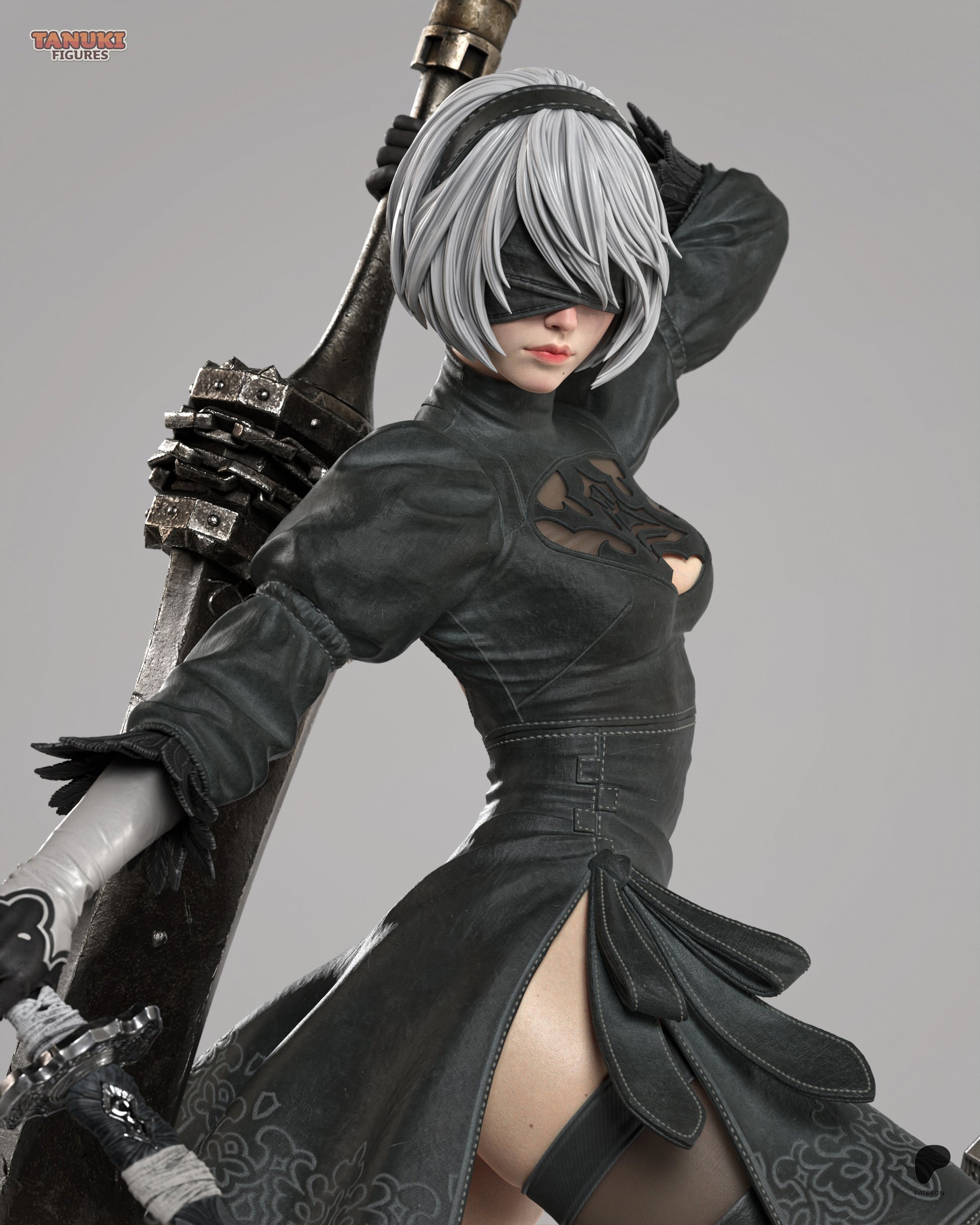 Fully painted full-body figure of 2B in her black dress and blindfold, posed with one hand on her head and a sword in the other, standing atop a mechanical wreck.