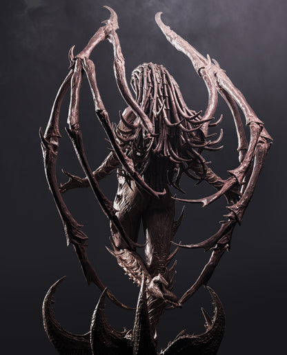 Rear view of Sarah Kerrigan Queen of Blades figure highlighting her segmented spines, organic wings, and detailed sculpting.