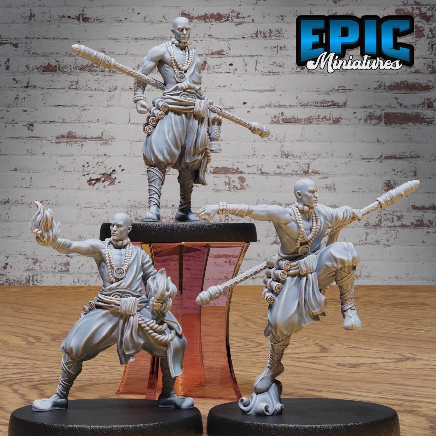 Set of three Shaolin Monks in various poses: attack, readiness, and casting, displaying versatility for RPG encounters.