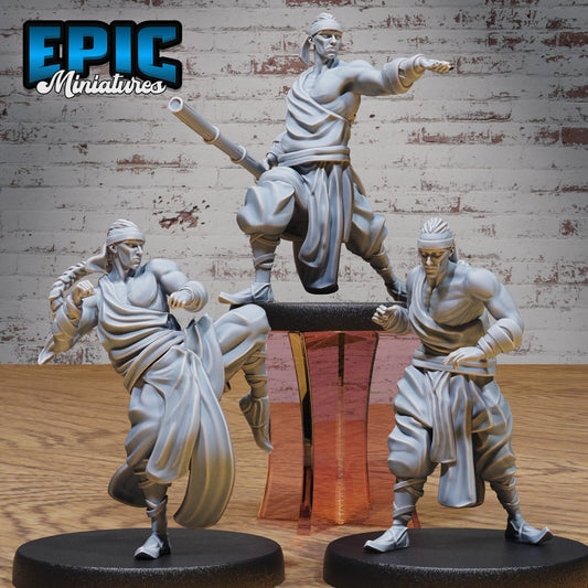 Collage of the Martial Arts Monk miniatures in various action poses: ready stance, high kick, and staff pointing. This monk isn’t just here for the combat—he’s here to look good while doing it in any TTRPG setting.