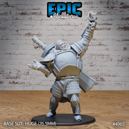 Fire Giant miniature in a victory stance with fist raised, heavy armored figure suitable for fantasy tabletop games.