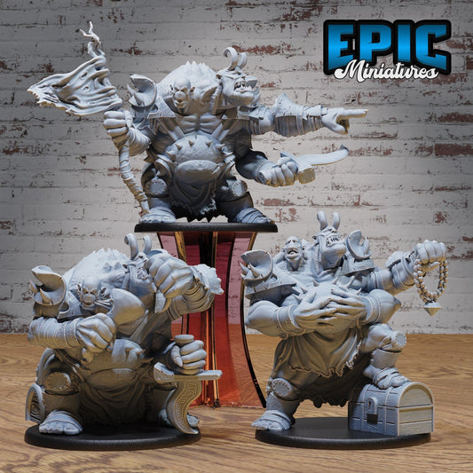 A massive two-headed Ettin mutant stands with one head roaring and the other bearing a sly expression. The creature holds a large beaded necklace and stands beside a treasure chest, adorned with spiked armor and various battle scars.