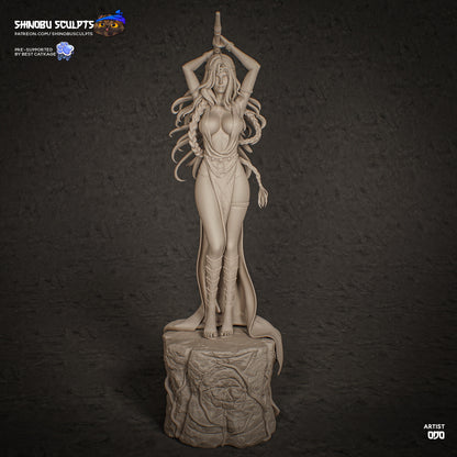 Alt tag: Marika Elden Ring 1:8 scale statue front angle showing raised weapon pose, flowing hair sculpt, draped clothing, and tree-root stone pedestal.