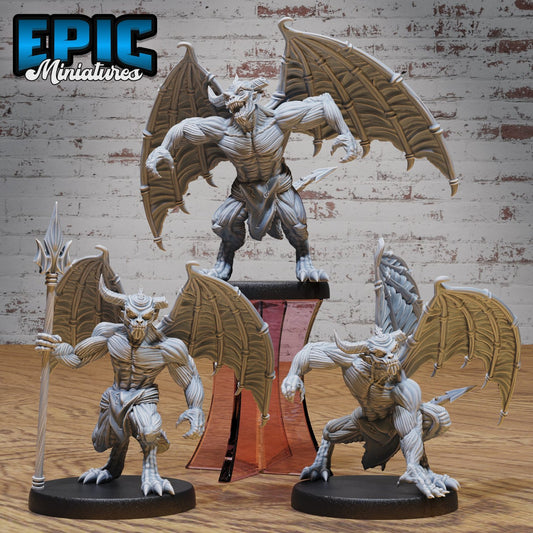 A trio of Devil Minion figurines posed for action, featuring wings, claws, and intense expressions, ideal for adding fiendish encounters to fantasy tabletop games.