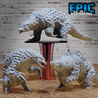 Collage of Giant Armadillo miniatures showing mounted, wild, and angry poses. A versatile addition to any Dungeons & Dragons campaign, with both peaceful and combative uses.