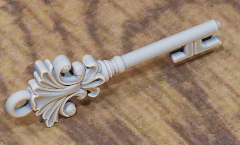Key with stylized curled‑flame bow and long shaft.