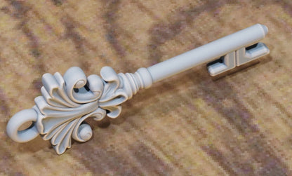 Key with stylized curled‑flame bow and long shaft.