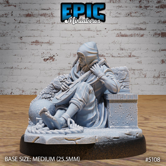 Prisoner miniature sitting barefoot against a stone wall, shackled and playing a lute, designed for Dungeons & Dragons or Pathfinder NPC encounters.