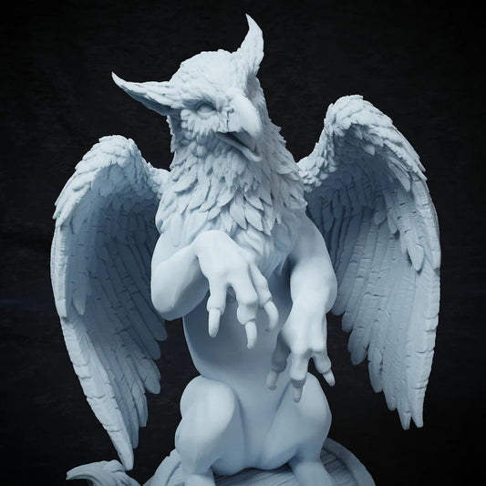 Close-up of griffin figurine showcasing feathered head and majestic expression.