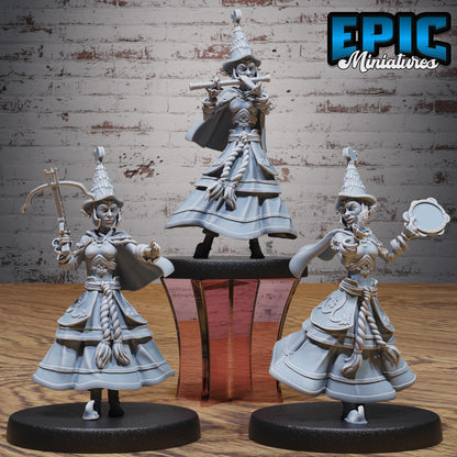 Group display of three Half-Elf Bard miniatures showing flute, crossbow, and tambourine variants, each posed dynamically in performance-ready stances on 25.5mm bases.