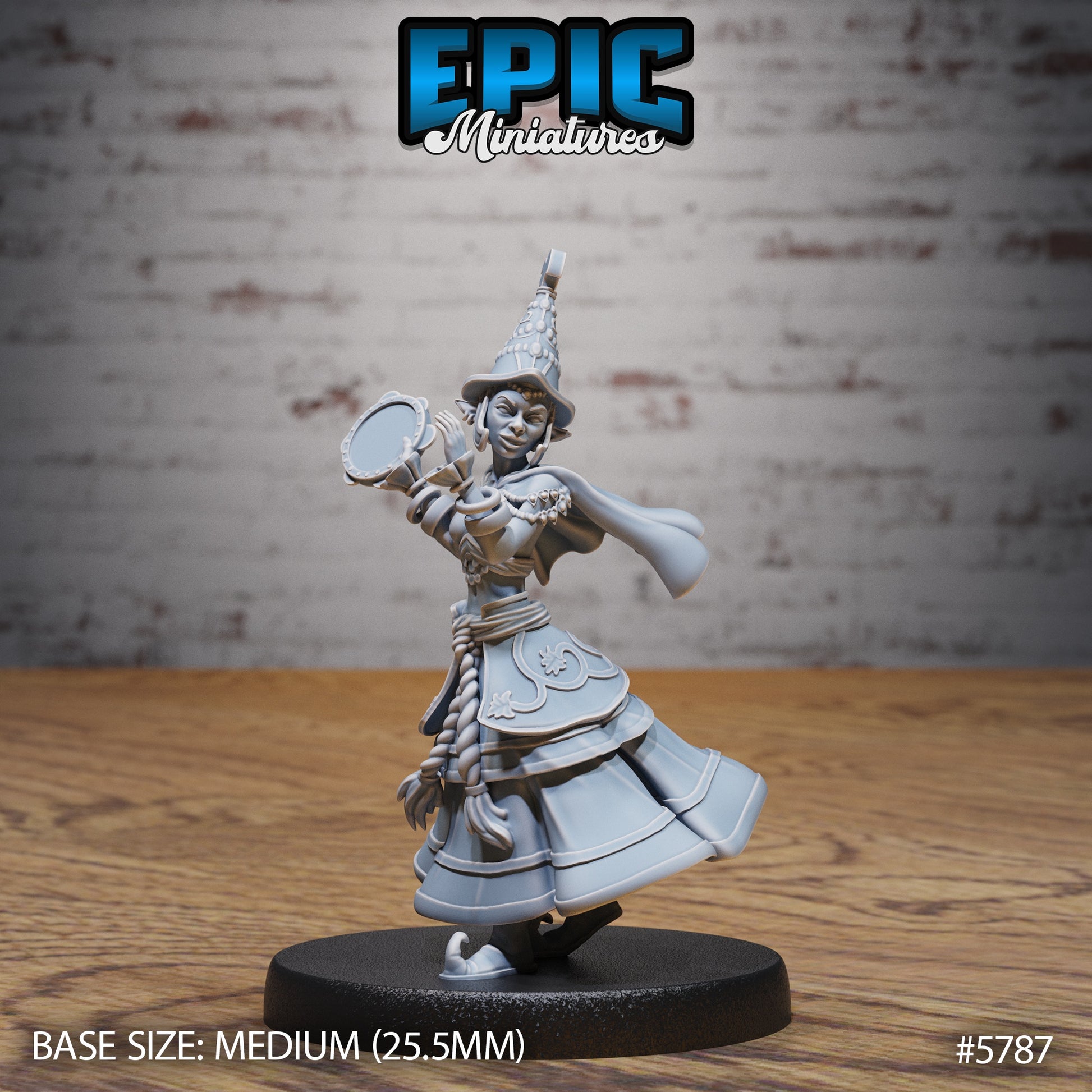 Half-Elf Bard miniature holding a tambourine mid-performance, dressed in layered skirts and ornate armor with braided hair and a pointed hat on a 25.5mm base.