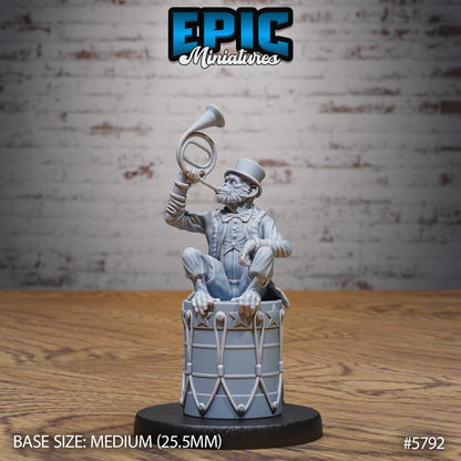 Monkey Director miniature seated on a drum and blowing a horn, dressed in formal circus attire with top hat, vest, and detailed coat, perfect for use as an NPC or performer in fantasy RPGs.