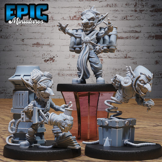 Collage of Goblin Tinkerer miniatures featuring multiple mechanical goblins with explosives, gadgets, and spring-loaded contraptions, all sculpted in detailed workshop poses on 25.5mm bases.