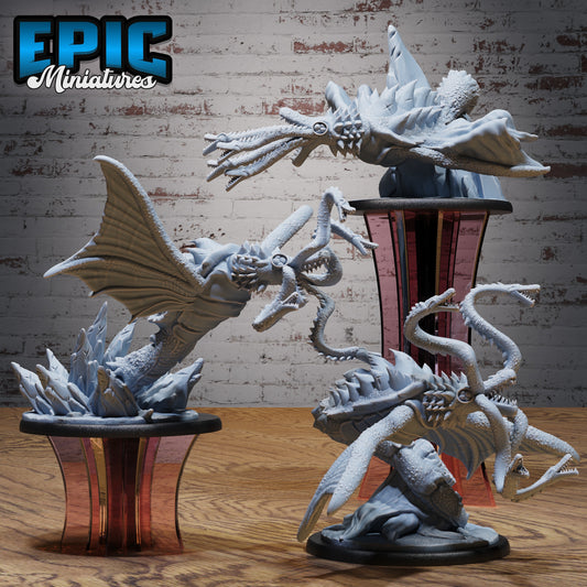 Group of Ancient Flayer large aberration miniatures featuring hydra-like creatures with multiple serpentine heads, scaled bodies, and wings, each posed differently to capture roaring, attacking, and slithering stances.