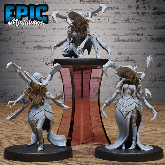 Group shot of three Spider Lady miniatures including standing, running, and crouching poses, medium bases for TTRPG play.