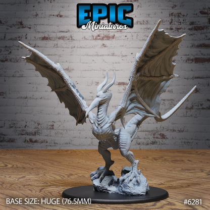 Cyclops wyvern monster miniature attack pose wings fully spread standing on rocky terrain single eye dragon creature Dungeons and Dragons resin miniature huge base